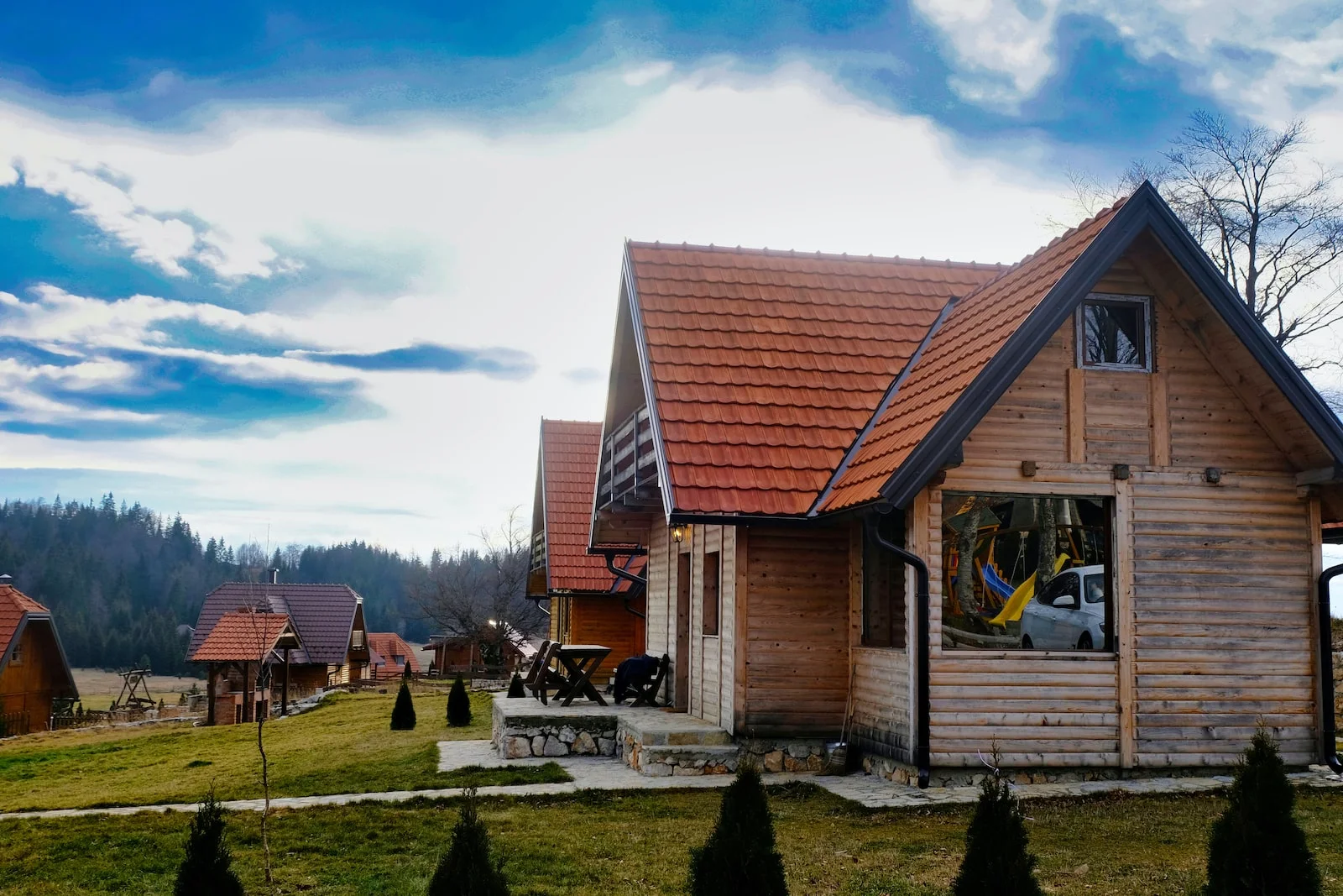 Serbie a small wooden house with a red roof
